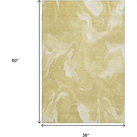 Gold And Ivory Abstract Washable Area Rug With UV Protection Photo 3