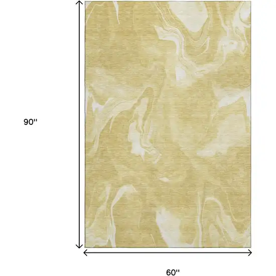 Gold And Ivory Abstract Washable Area Rug With UV Protection Photo 3