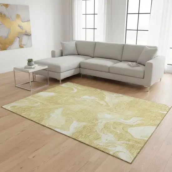 Gold And Ivory Abstract Washable Area Rug With UV Protection Photo 2