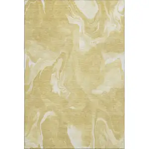 Photo of Gold And Ivory Abstract Washable Area Rug With UV Protection