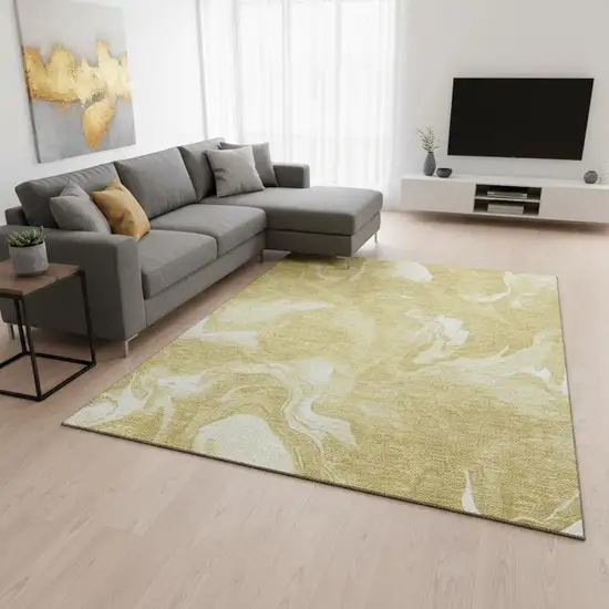 Gold And Ivory Abstract Washable Area Rug With UV Protection Photo 2