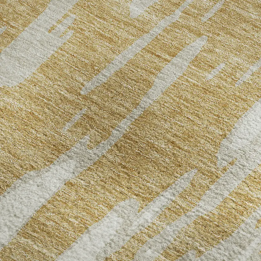 Gold And Ivory Abstract Washable Area Rug With UV Protection Photo 3