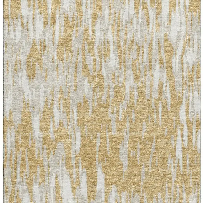 Gold And Ivory Abstract Washable Area Rug With UV Protection Photo 4