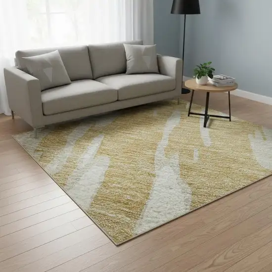 Gold And Ivory Abstract Washable Area Rug With UV Protection Photo 2