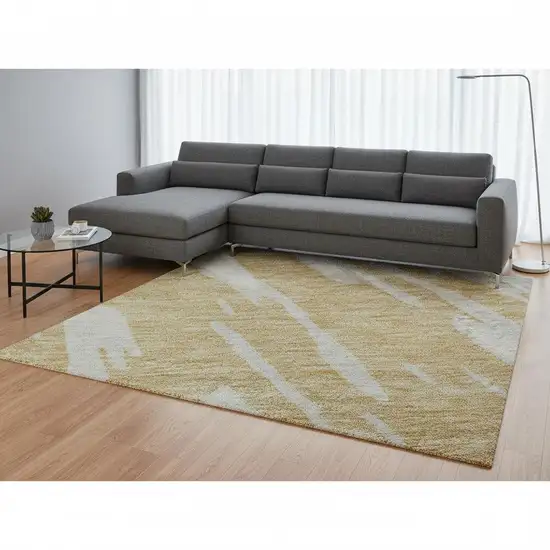 Gold And Ivory Abstract Washable Area Rug With UV Protection Photo 2