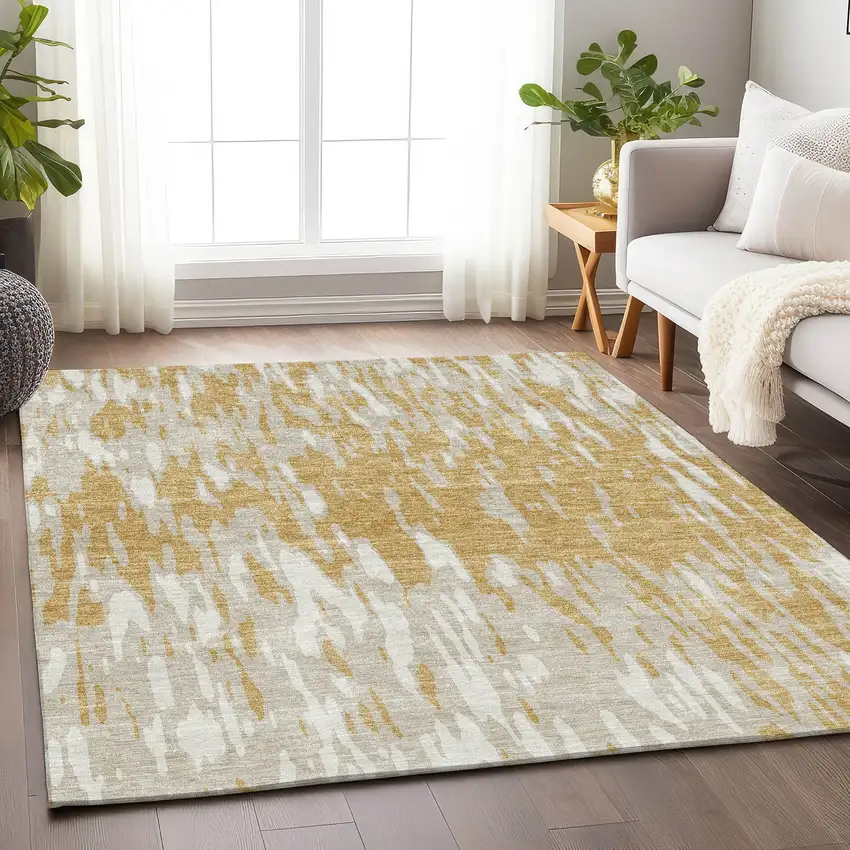 Gold And Ivory Abstract Washable Area Rug With UV Protection Photo 3