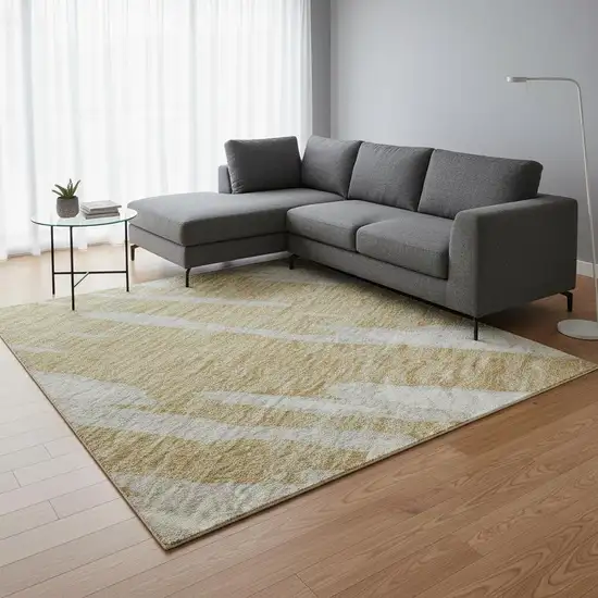 Gold And Ivory Abstract Washable Area Rug With UV Protection Photo 2