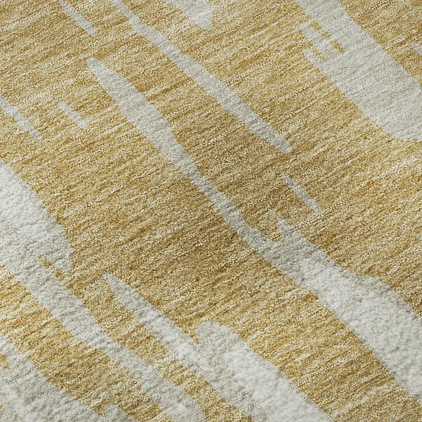 Gold And Ivory Abstract Washable Area Rug With UV Protection Photo 1