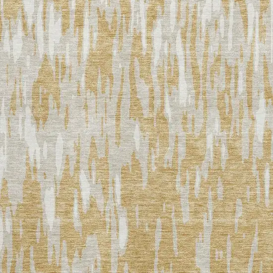 Gold And Ivory Abstract Washable Area Rug With UV Protection Photo 3