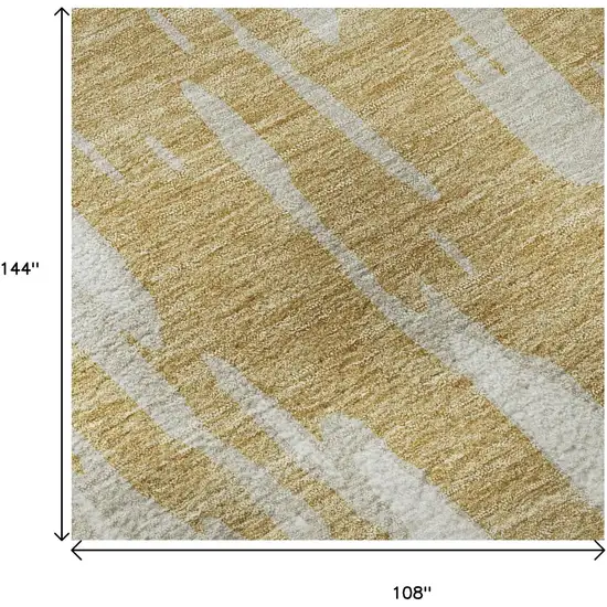 Gold And Ivory Abstract Washable Area Rug With UV Protection Photo 9