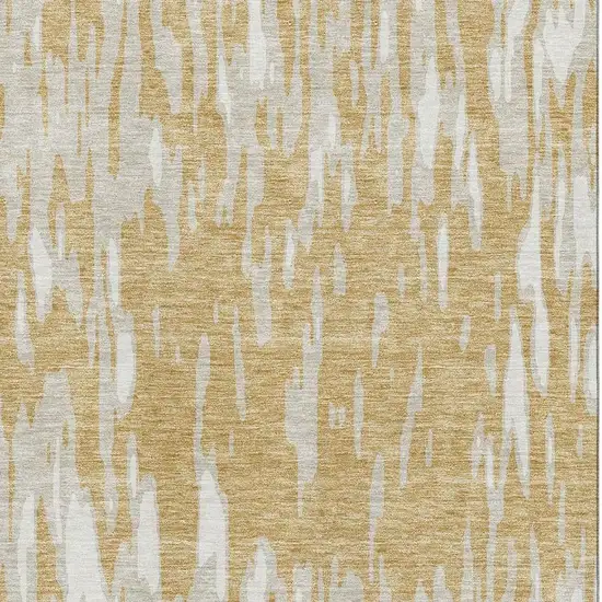 Gold And Ivory Abstract Washable Area Rug With UV Protection Photo 3