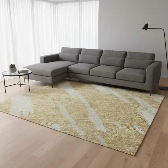Gold And Ivory Abstract Washable Area Rug With UV Protection Photo 2