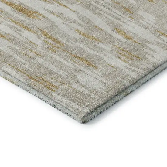Gold And Ivory Abstract Washable Area Rug With UV Protection Photo 7