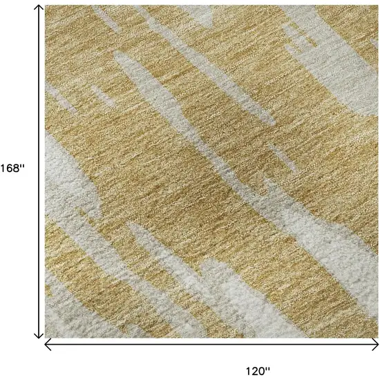 Gold And Ivory Abstract Washable Area Rug With UV Protection Photo 9