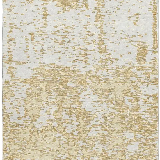 Gold And Ivory Abstract Washable Area Rug With UV Protection Photo 3