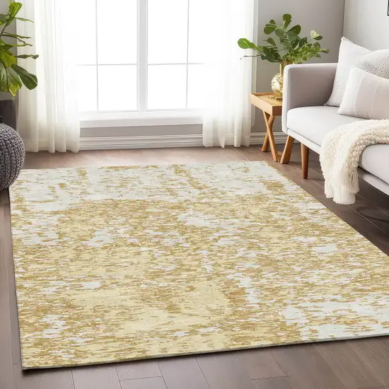 Gold And Ivory Abstract Washable Area Rug With UV Protection Photo 3