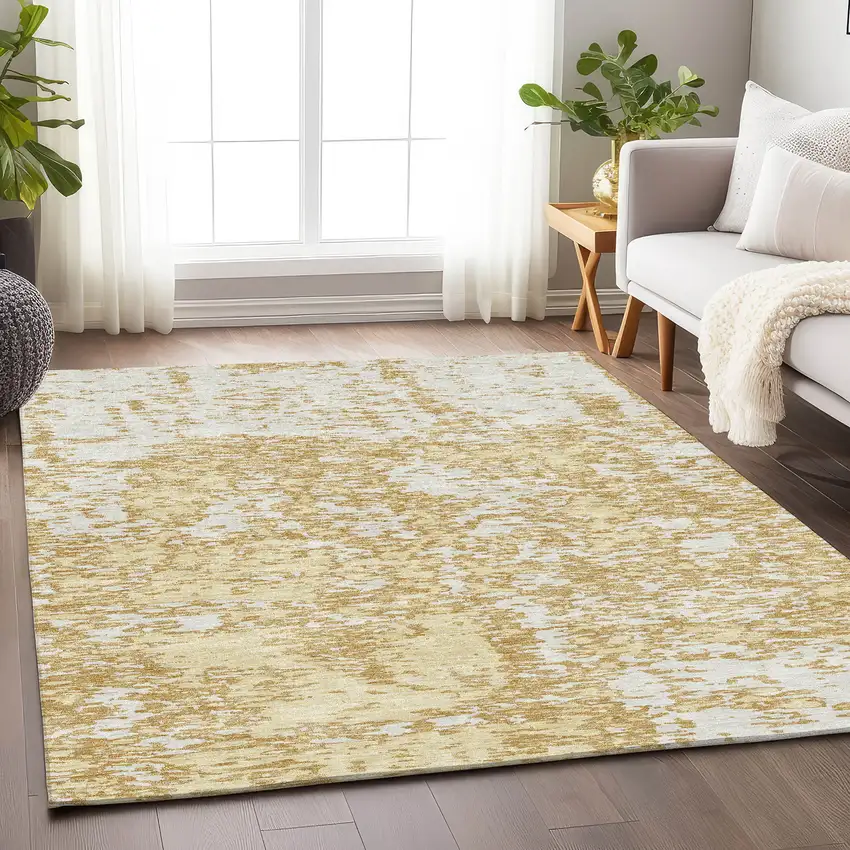 Gold And Ivory Abstract Washable Area Rug With UV Protection Photo 3