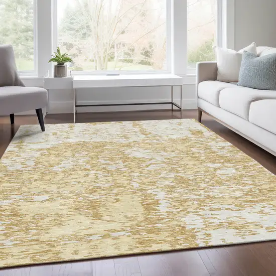Gold And Ivory Abstract Washable Area Rug With UV Protection Photo 4