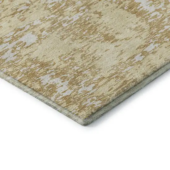 Gold And Ivory Abstract Washable Area Rug With UV Protection Photo 7