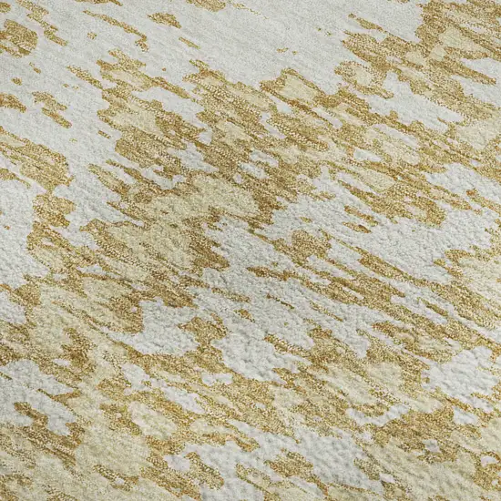 Gold And Ivory Abstract Washable Area Rug With UV Protection Photo 2