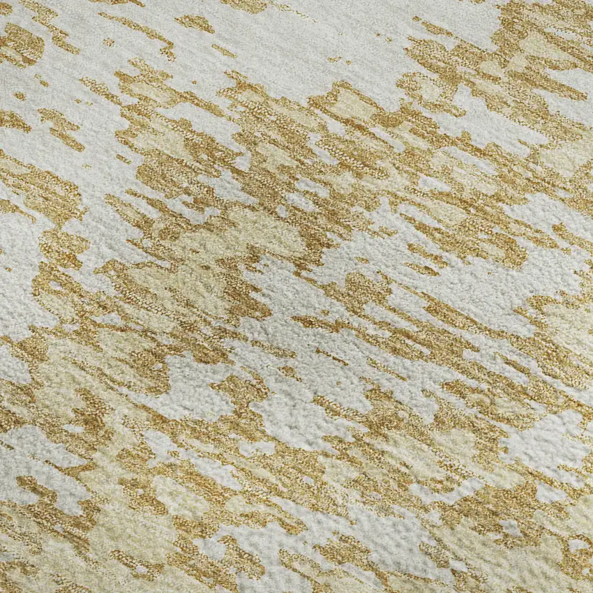 Gold And Ivory Abstract Washable Area Rug With UV Protection Photo 2