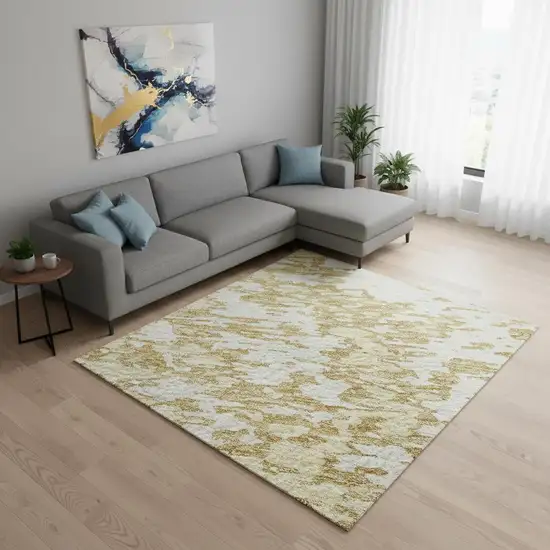 Gold And Ivory Abstract Washable Area Rug With UV Protection Photo 2