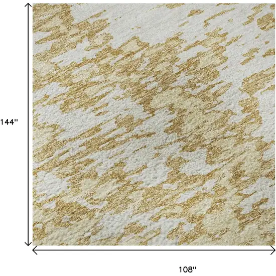 Gold And Ivory Abstract Washable Area Rug With UV Protection Photo 9