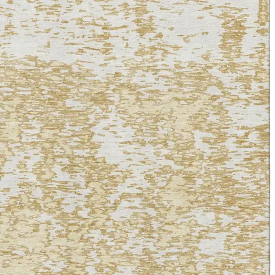 Gold And Ivory Abstract Washable Area Rug With UV Protection Photo 2