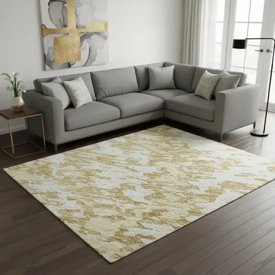 Gold And Ivory Abstract Washable Area Rug With UV Protection Photo 2