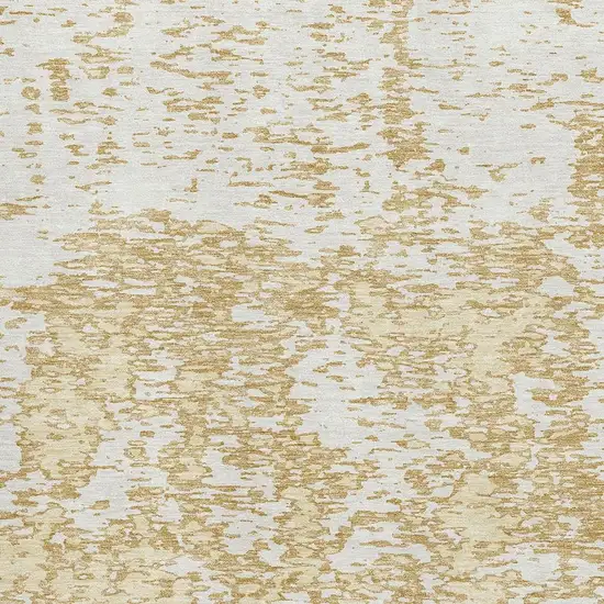 Gold And Ivory Abstract Washable Area Rug With UV Protection Photo 2