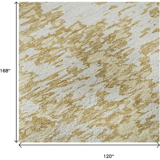 Gold And Ivory Abstract Washable Area Rug With UV Protection Photo 9