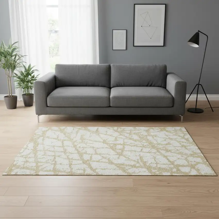 Gold And Ivory Abstract Washable Area Rug With UV Protection Photo 2