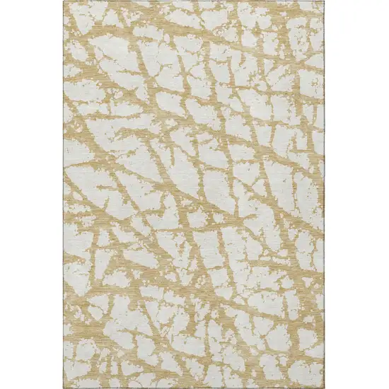 Gold And Ivory Abstract Washable Area Rug With UV Protection Photo 3