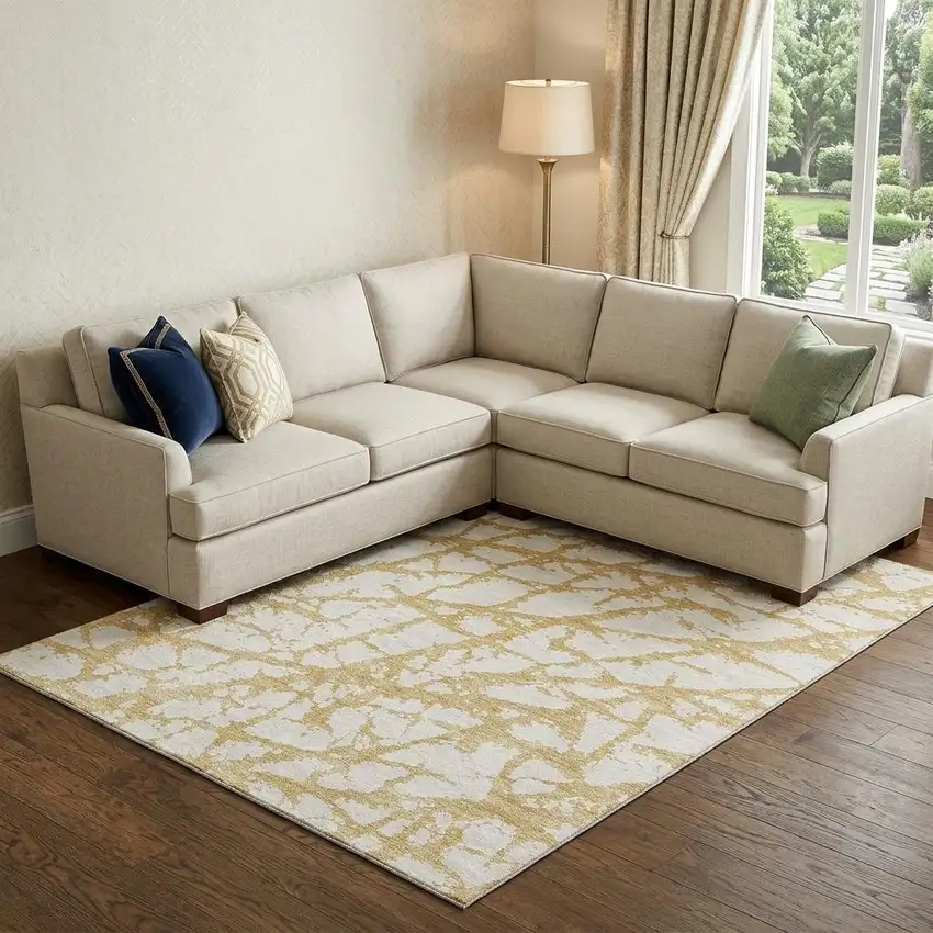Gold And Ivory Abstract Washable Area Rug With UV Protection Photo 1