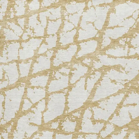 Gold And Ivory Abstract Washable Area Rug With UV Protection Photo 2