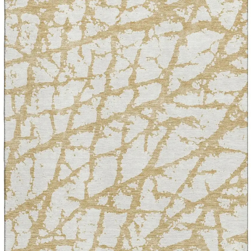 Gold And Ivory Abstract Washable Area Rug With UV Protection Photo 3