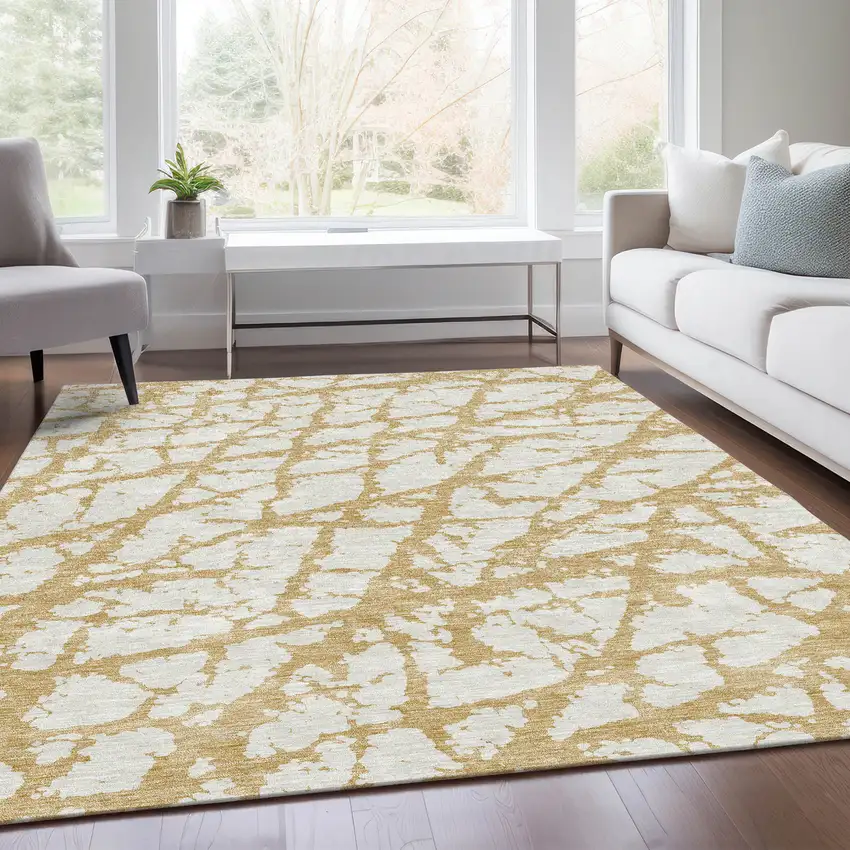 Gold And Ivory Abstract Washable Area Rug With UV Protection Photo 5