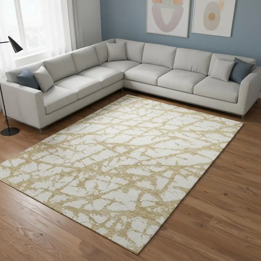 Gold And Ivory Abstract Washable Area Rug With UV Protection Photo 2