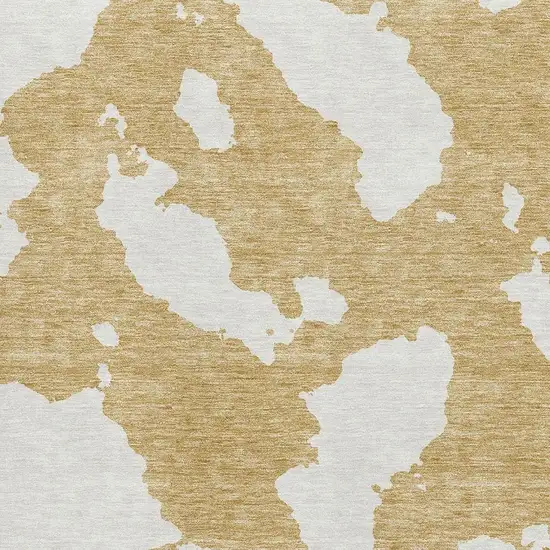 Gold And Ivory Abstract Washable Area Rug With UV Protection Photo 3