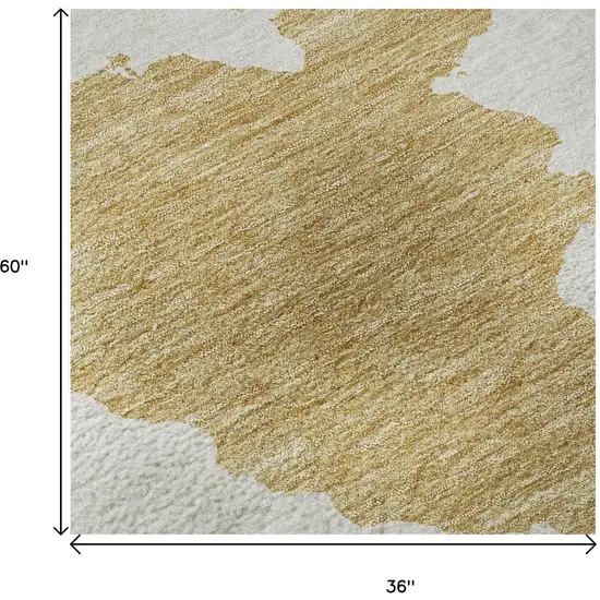 Gold And Ivory Abstract Washable Area Rug With UV Protection Photo 9