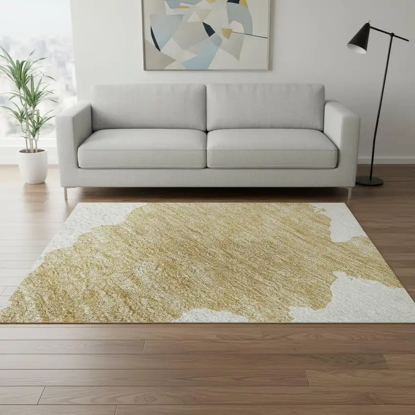 Gold And Ivory Abstract Washable Area Rug With UV Protection Photo 2
