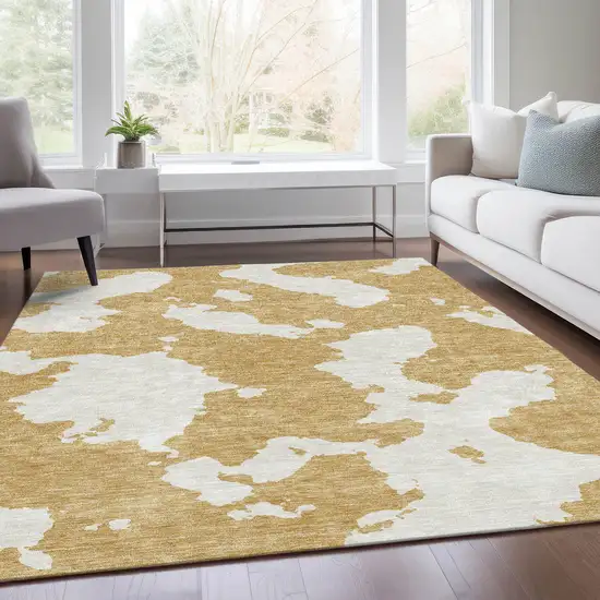 Gold And Ivory Abstract Washable Area Rug With UV Protection Photo 4