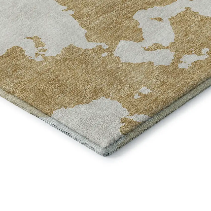 Gold And Ivory Abstract Washable Area Rug With UV Protection Photo 8