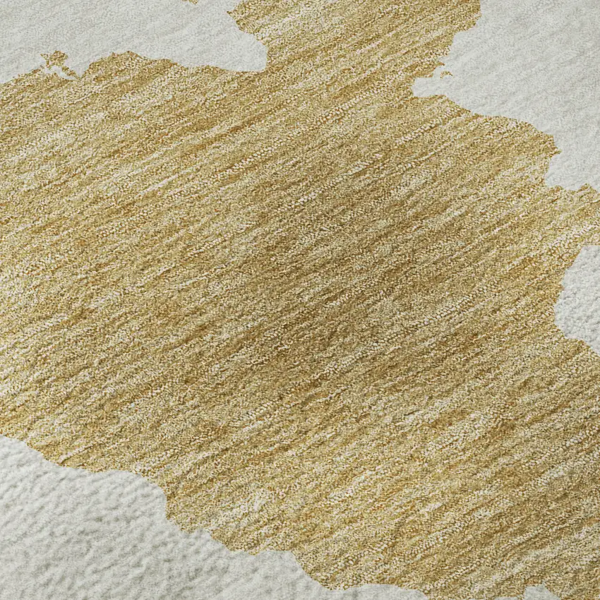 Gold And Ivory Abstract Washable Area Rug With UV Protection Photo 1