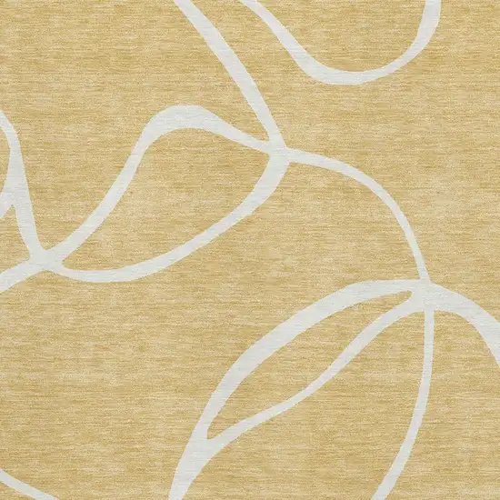 Gold And Ivory Abstract Washable Area Rug With UV Protection Photo 3