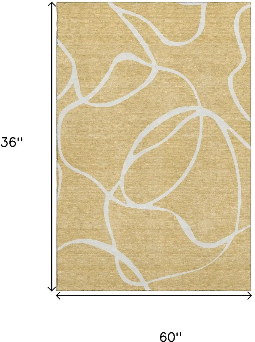Gold And Ivory Abstract Washable Area Rug With UV Protection Photo 9