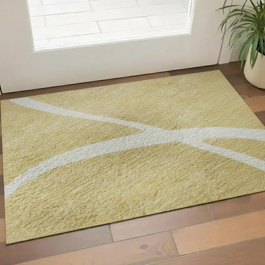 Gold And Ivory Abstract Washable Area Rug With UV Protection Photo 2