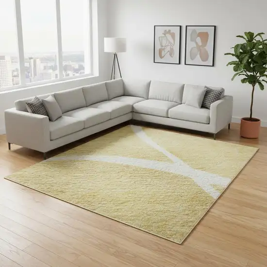 Gold And Ivory Abstract Washable Area Rug With UV Protection Photo 2