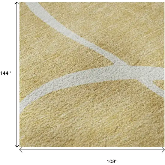 Gold And Ivory Abstract Washable Area Rug With UV Protection Photo 9