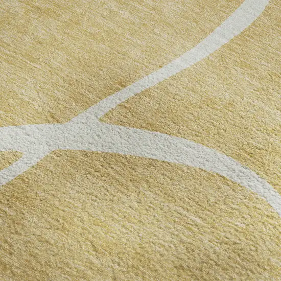 Gold And Ivory Abstract Washable Area Rug With UV Protection Photo 2